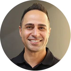 Professional portrait of Dr. Khaef, an experienced and compassionate dentist at Harmony Dental Care.